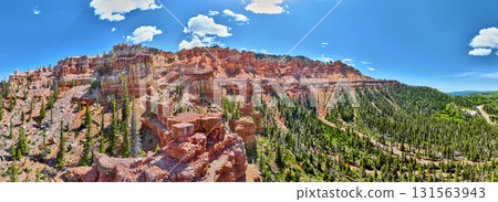 Aerial Panoramic Red Rock Formations Forest and Blue Sky in Utah Wilderness 131563943