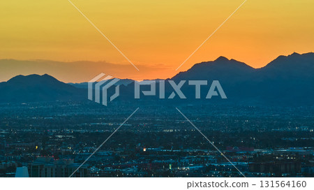 Aerial Las Vegas Skyline Downtown The Strip and Mountains at Golden Hour 131564160
