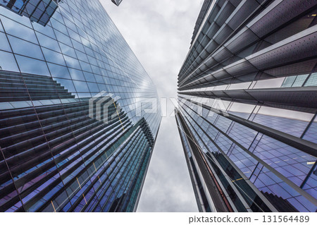 Modern Glass Skyscrapers in London with Reflections 131564489