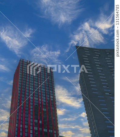 Low-angle view of a contemporary high-rise with a moderne facade  131564785