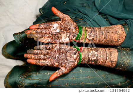 Fresh Mehndi Design on Hands with Intricate Patterns Fresh Mehndi Design on Hands with Intricate Patterns 131564922