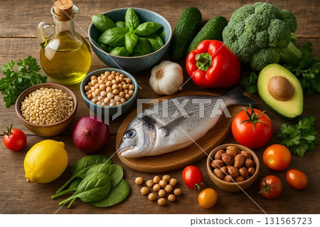 Mediterranean cuisine ingredients set: fish, vegetables, olive oil, and beans 131565723