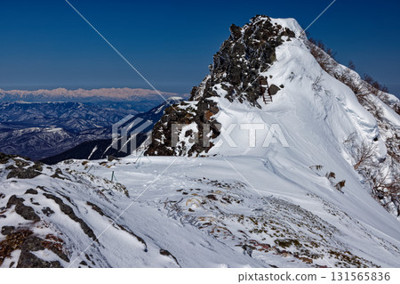 View of the Yatsugatake Mountain Range, Yokodake and Hakuba Mountain Range in winter from the Trident 131565836
