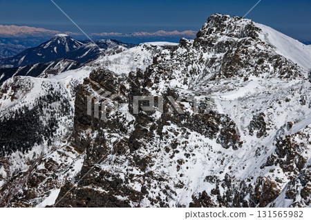 Winter in the Yatsugatake Mountain Range: Rock faces of Mt. Yokodake and Mt. Tateshina Winter in the Yatsugatake Mountain Range: Rock faces of Mt. Yokodake and Mt. Tateshina 131565982