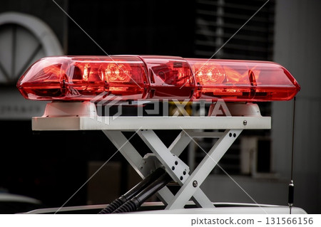 Red lights of a police car on duty 131566156