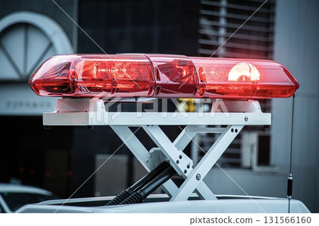Red lights of a police car on duty 131566160