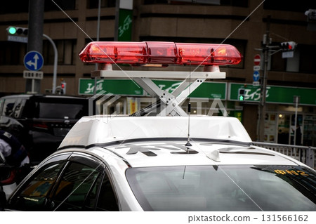 Red lights of a police car on duty Red lights of a police car on duty 131566162