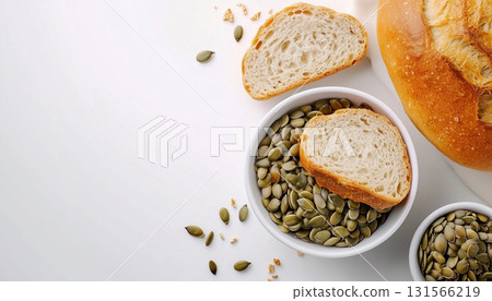 Pumpkin seed on bowl and loaf bread for simple breakfast 131566219