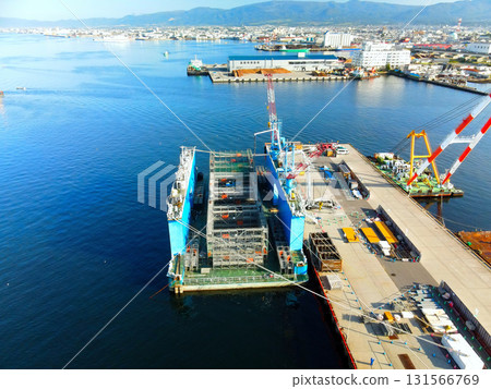 Aerial view of caisson construction work at Hakodate Port in Hakodate, Hokkaido in autumn Aerial view of caisson construction work at Hakodate Port in Hakodate, Hokkaido in autumn 131566769