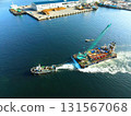 Aerial view of a barge and tugboat heading to a construction site at Hakodate Port in Hakodate, Hokkaido in autumn 131567068