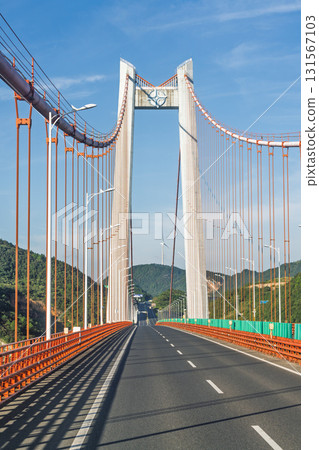 Modern suspension bridge highway scenery Modern suspension bridge highway scenery 131567103