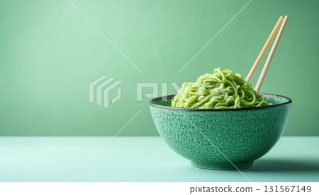 Gluten free green vegetable flour noodle healthy Mie pasta on bowl and chopsticks 131567149
