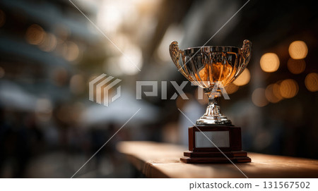 A close-up of a gleaming gold trophy 131567502