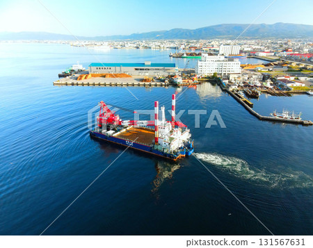 Aerial view of a crane ship heading to a construction site at Hakodate Port in Hakodate, Hokkaido in autumn 131567631