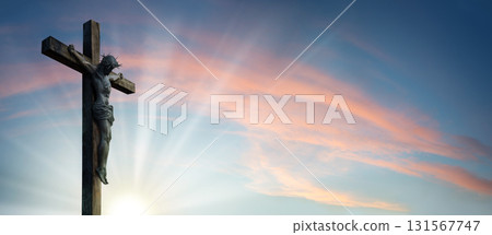 Crucified Christ hangs on the cross Crucified Christ hangs on the cross 131567747