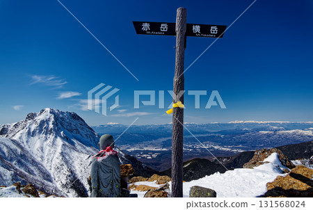 View of Mt. Amida, Mt. Ontake, and the Northern Alps from the Jizo Ridge of Mt. Akadake in the Yatsugatake Mountain Range 131568024