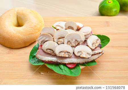White mushrooms on a bagel White mushrooms on a bagel 131568078