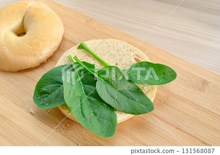 Baby leaves in a bagel Baby leaves in a bagel 131568087