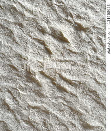 Image shows textured surface of off white mulberry paper with soft shadows, highlighting its fibrous and natural appearance Image shows textured surface of off white mulberry paper with soft shadows, highlighting its fibrous and natural appearance 131568638