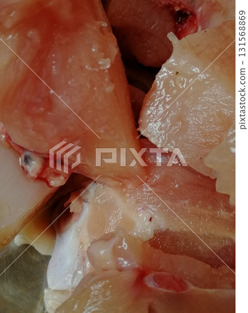 Raw Bresse chicken meat is the most testier in the world. Different parts of chicken ready to cook delicious and famous recipe like peri-peri, fried, Pollo al acuyo, Karaage, Ayam goreng Raw Bresse chicken meat is the most testier in the world. Different parts of chicken ready to cook delicious and famous recipe like peri-peri, fried, Pollo al acuyo, Karaage, Ayam goreng 131568869