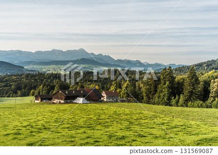 Alpstein mountains with Saentis peak and rural farm, Canton of St. Gallen, Switzerland Alpstein mountains with Saentis peak and rural farm, Canton of St. Gallen, Switzerland 131569087