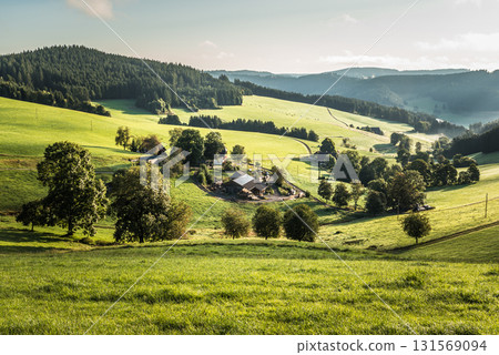 Scenic farmstead in rolling hills of Jostal valley, Black Forest, Titisee-Neustadt, Germany Scenic farmstead in rolling hills of Jostal valley, Black Forest, Titisee-Neustadt, Germany 131569094