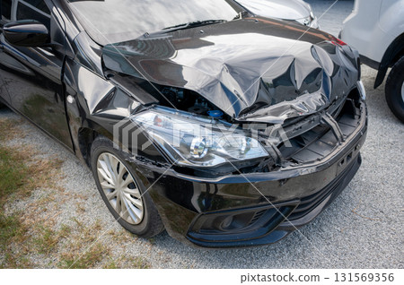 Frontal car crash with deformed hood and broken grille - digital inspection system for automotive damage analytics and insurance process 131569356
