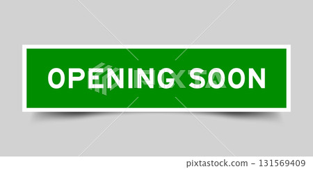 Green color square shape sticker label with word opening soon on gray background Green color square shape sticker label with word opening soon on gray background 131569409