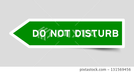 Green color arrow shape sticker label with word do not disturb on gray background Green color arrow shape sticker label with word do not disturb on gray background 131569456
