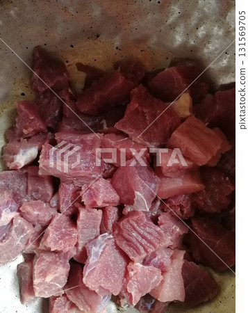 Raw beef steak meat. Delicious mixed Kobe and wagyu beef meat pieces to make famous recipe like barbeque, picanha, bourguignon, goulash, gourmet, stroganoff, ragout etc 131569705