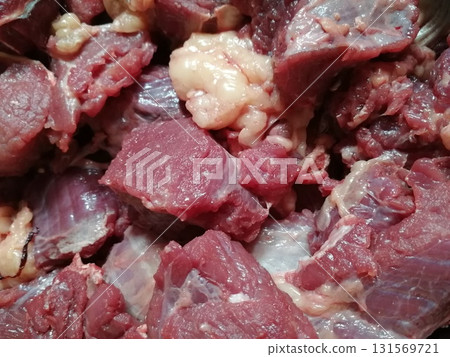 Raw beef steak meat. Delicious mixed Kobe and wagyu beef meat pieces to make famous recipe like barbeque, picanha, bourguignon, goulash, gourmet, stroganoff, ragout etc Raw beef steak meat. Delicious mixed Kobe and wagyu beef meat pieces to make famous recipe like barbeque, picanha, bourguignon, goulash, gourmet, stroganoff, ragout etc 131569721