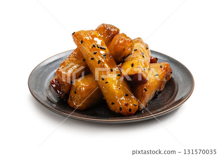Sweet potato sticks cut into pieces Sweet potato sticks cut into pieces 131570035