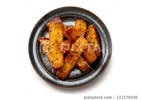 Sweet potato sticks cut into pieces Sweet potato sticks cut into pieces 131570036