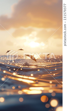 Dolphins leaping over ocean waves at sunset Dolphins leaping over ocean waves at sunset 131570377