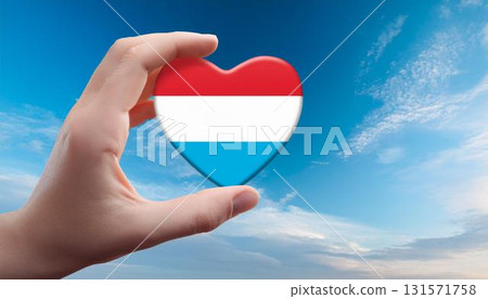 Luxembourg flag heart shape and blue sky 131571758