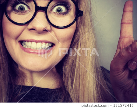 Closeup woman happy face with eyeglasses Closeup woman happy face with eyeglasses 131572415