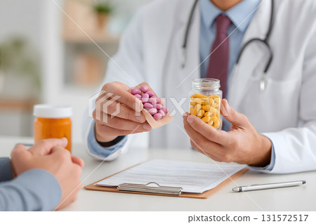Doctor Prescribing Supplements to Patient Doctor Prescribing Supplements to Patient 131572517