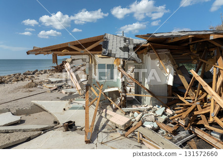 Destroyed houses on ocean shore after hurricane Milton landfall. Natural disaster consequences on Manasota Key, Florida. Storm surge severe damage Destroyed houses on ocean shore after hurricane Milton landfall. Natural disaster consequences on Manasota Key, Florida. Storm surge severe damage 131572660