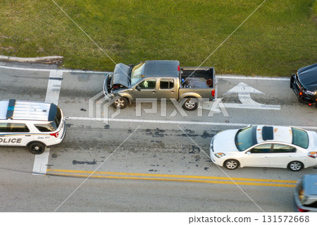 Damaged cars in traffic accident on American road 131572668