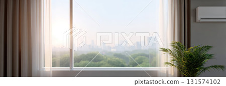 Calm morning view from living room window with curtain showing hazy city skyline over green tree. peaceful interior with an air conditioner and potted plant 131574102
