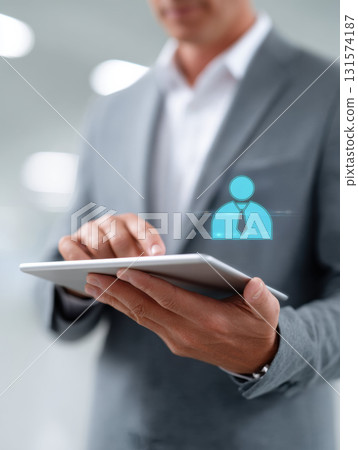 Focused manager and businessman approving workflow on tablet. Professional using business technology and digital icon for project management and modern organization 131574187