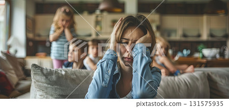Stressed mother at home with children Stressed mother at home with children 131575935