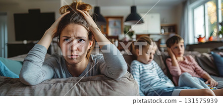 Stressed mother at home with children Stressed mother at home with children 131575939