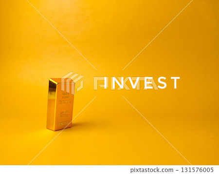 The image, featuring a gold bar and the word INVEST suggests the topic of gold investment. The image, featuring a gold bar and the word INVEST suggests the topic of gold investment. 131576005