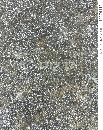 Rough concrete texture with scattered white gravel, weathered pavement surface, closeup detail, earthy tones, rough grain Rough concrete texture with scattered white gravel, weathered pavement surface, closeup detail, earthy tones, rough grain 131576315
