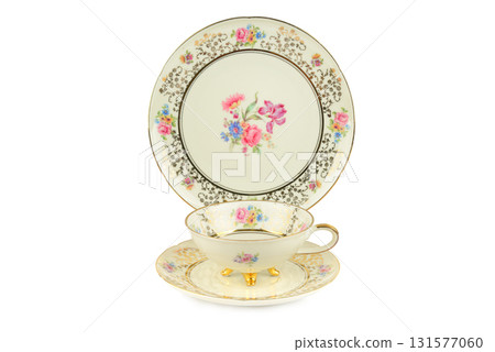 Vintage Porcelain Tea Set with a Gold Rim. Antique Teacup, Saucer, and Plate. 131577060