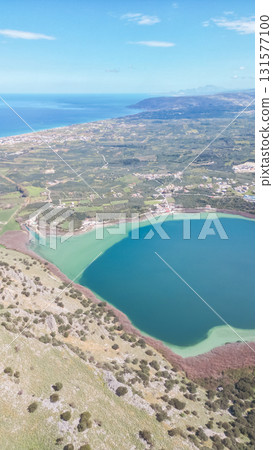 Aerial view of Lake Kournas in Crete and Cretan Sea. Aerial view of Lake Kournas in Crete and Cretan Sea. 131577100