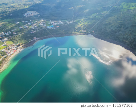Scenic Lake Kournas in Crete on sunny day aerial view. Scenic Lake Kournas in Crete on sunny day aerial view. 131577102