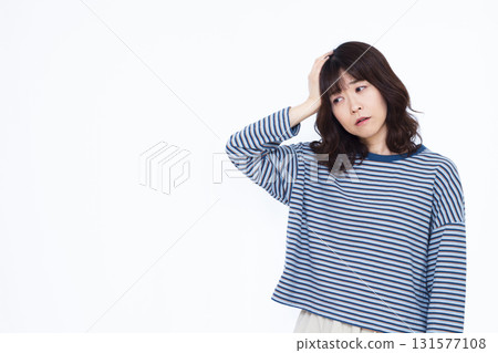 A woman with a headache A woman with a headache 131577108
