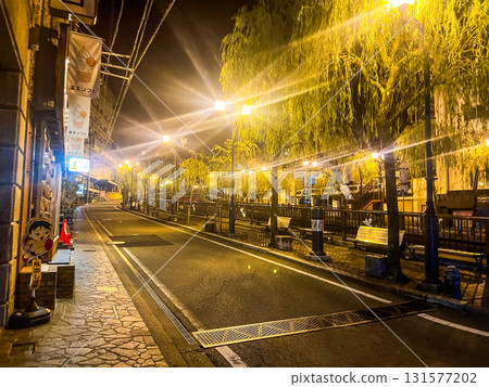 Streetlights and illuminated willow trees illuminating the hot spring town at night (Gero City) Streetlights and illuminated willow trees illuminating the hot spring town at night (Gero City) 131577202